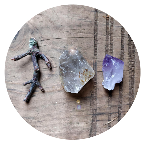 An interesting stick, some crystal quartz and some amethyst.