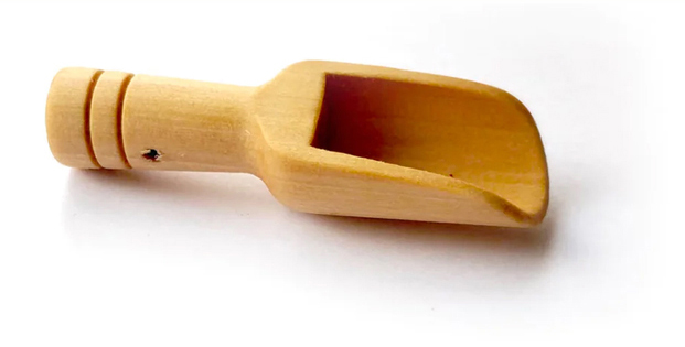 A wooden scoop. Perfect for your altar. Use it for spell ingredients and incense,