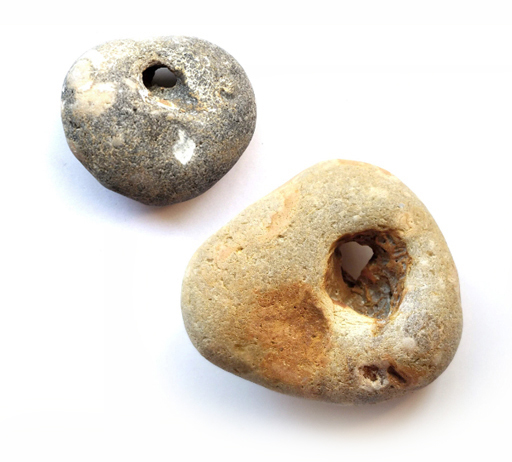 Two hag stones. Odine stones. Fairy stones. Stones with a hole through the middle.